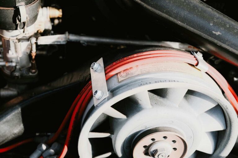 Detailed view of a vehicle electrical wiring loom and fuse box under the bonnet, showing professional car wiring repairs in Sheffield.