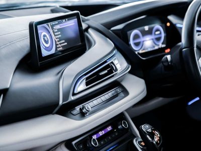 A modern touch-screen infotainment system and head unit fitted into a car dashboard console by a car stereo installation specialist in Sheffield.