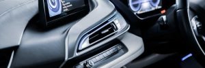 A modern touch-screen infotainment system and head unit fitted into a car dashboard console by a car stereo installation specialist in Sheffield.