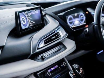 A modern touch-screen infotainment system and head unit fitted into a car dashboard console by a car stereo installation specialist in Sheffield.